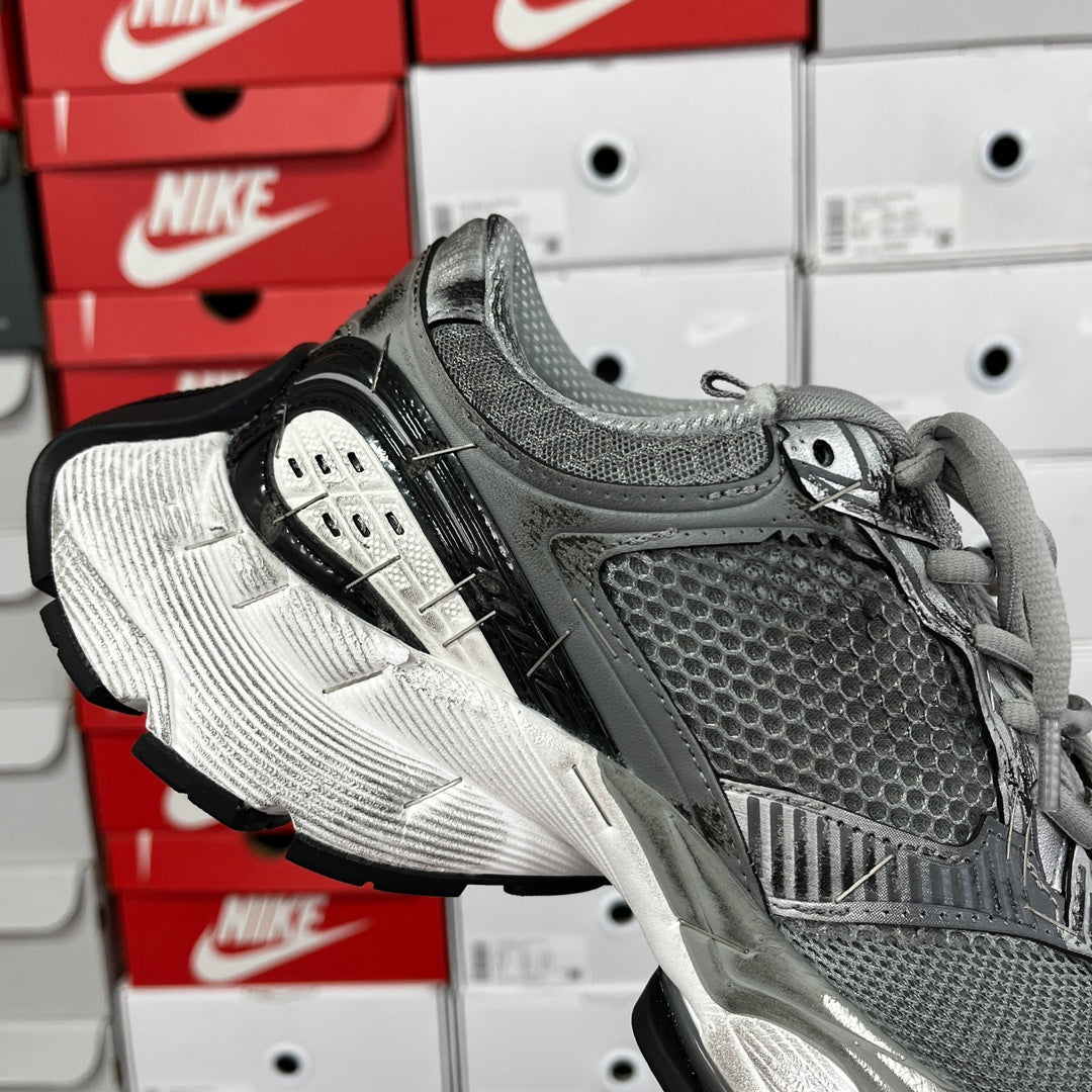 Unisex Balenciaga running shoe, dark gray upper with silver toe guard and black sole
