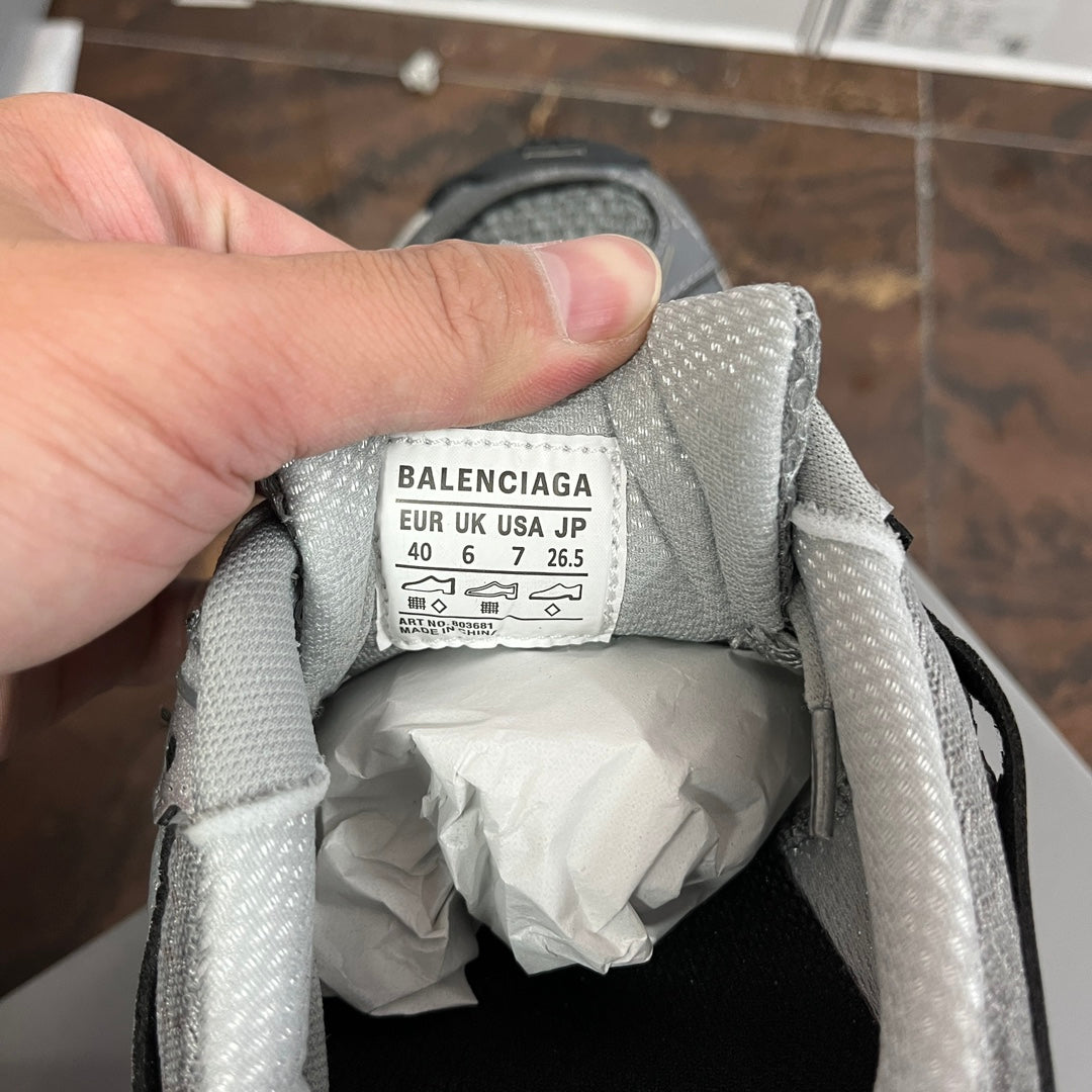 Unisex Balenciaga shoe size label inside collar, printed on light gray fabric