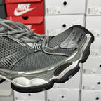 Unisex Balenciaga running shoes, close-up of dark gray mesh and metallic silver trim