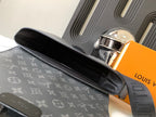 Louis Vuitton bag with open top and black lining, dark monogram canvas, adjustable strap.