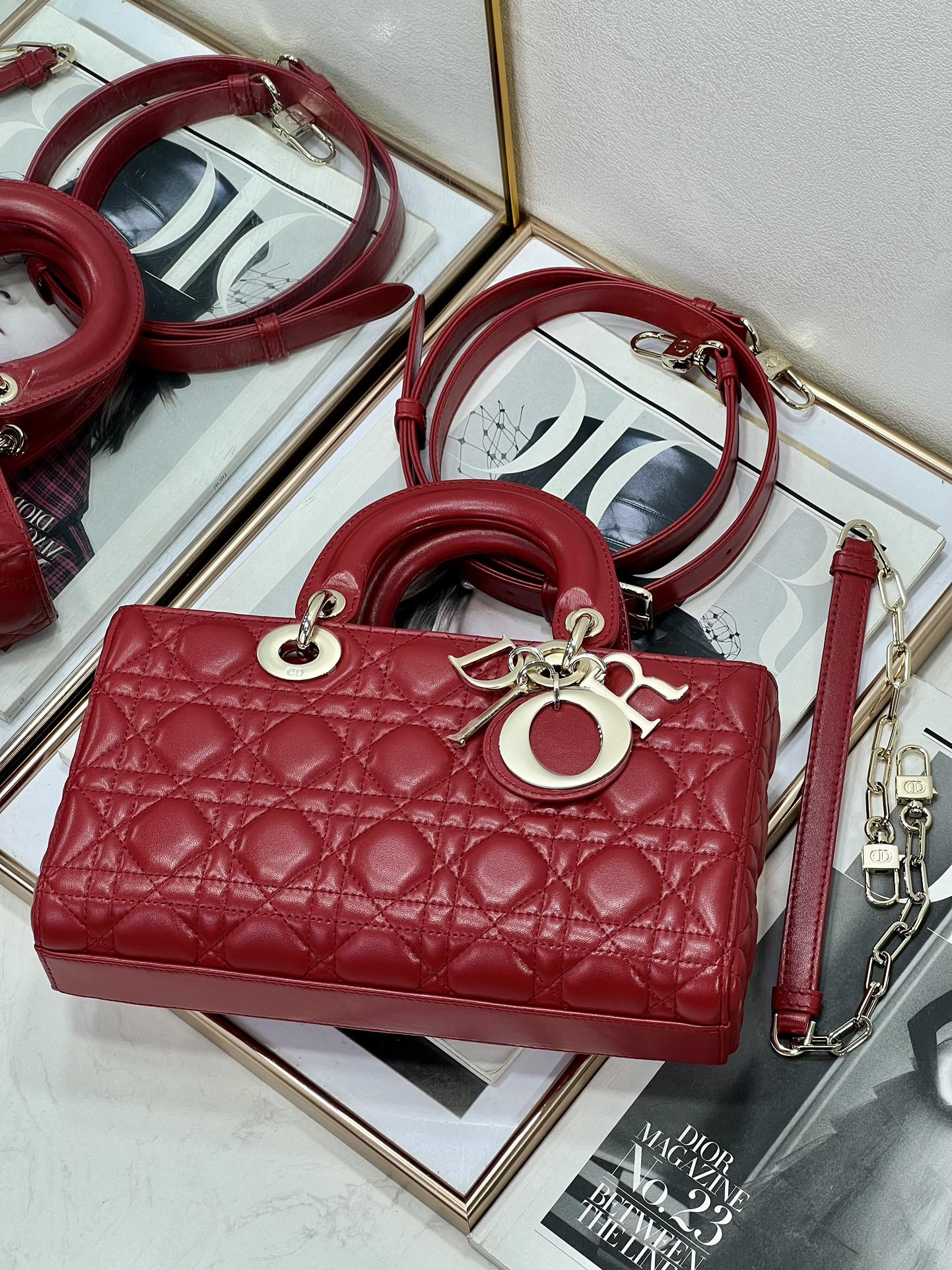Dior red quilted mini handbag with top handle and detachable shoulder strap