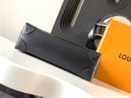 Louis Vuitton monogram long pouch-style bag with top handle, dark gray.