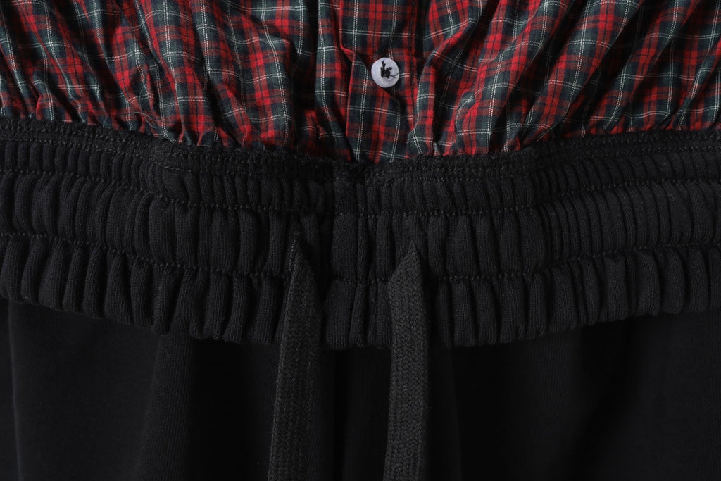 Black shorts waistband with gathered elastic and drawstring ties