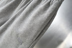Balenciaga gray shorts side panel with seam and small embroidered logo