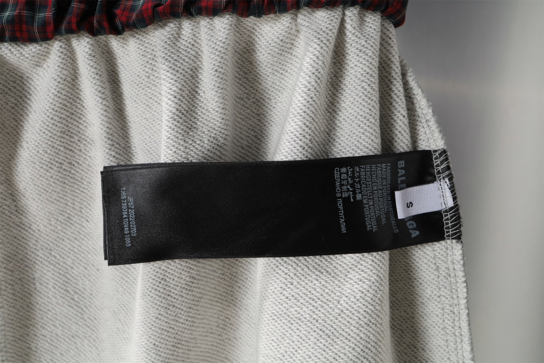 Balenciaga gray shorts with black care label at waistband