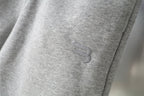 Balenciaga gray shorts leg with small embroidered logo detail