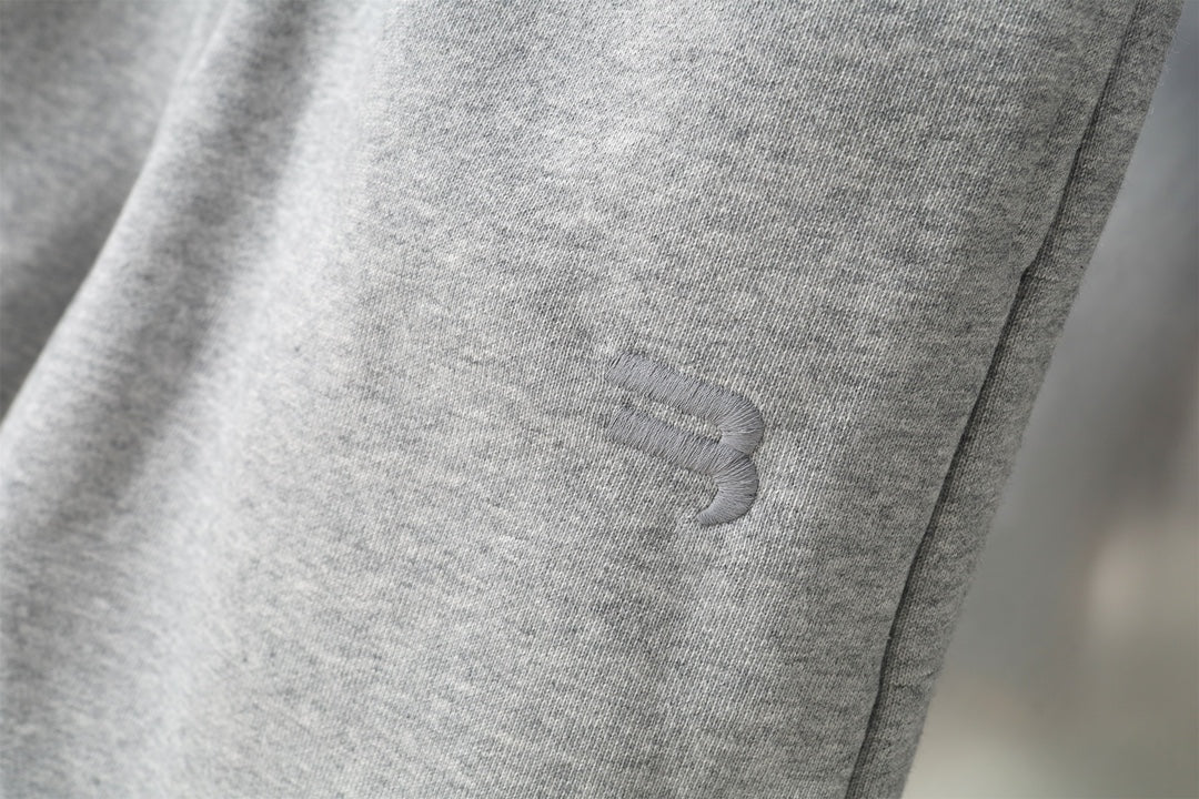 Balenciaga gray shorts leg with small embroidered logo detail
