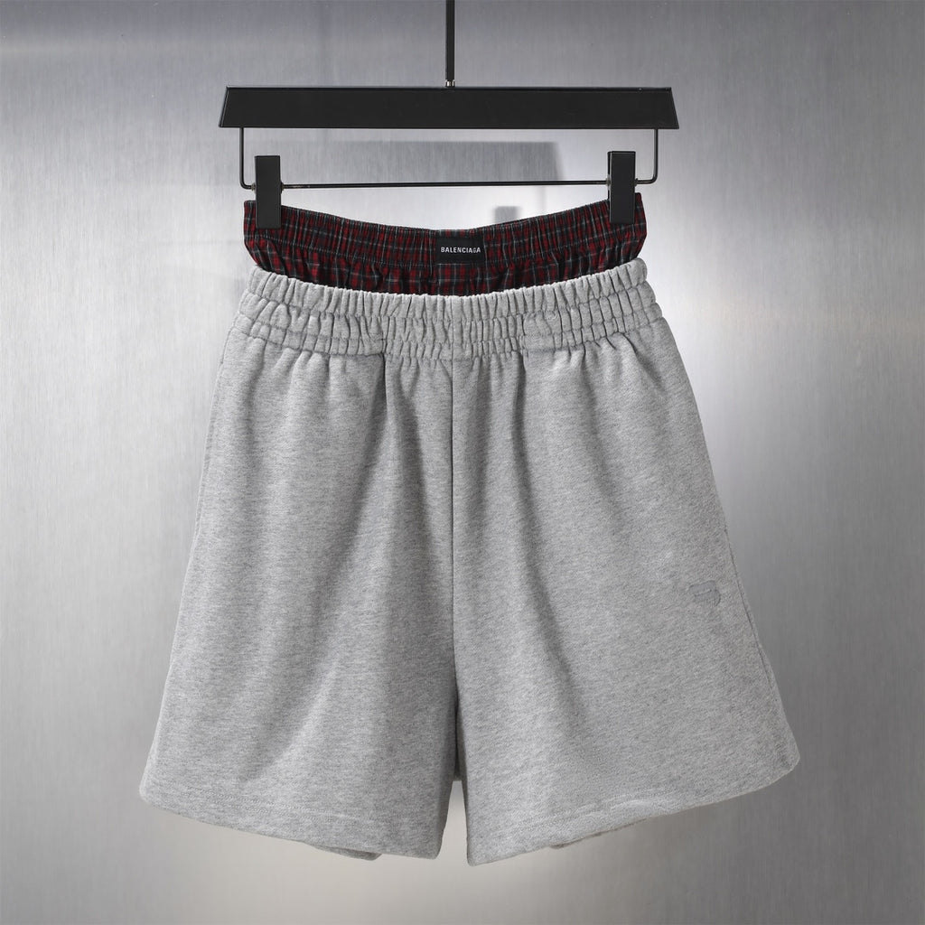 Balenciaga gray sweat shorts with elastic waistband and side pockets