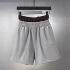 Balenciaga gray sweat shorts with elastic waistband and side pockets