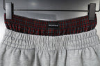 Balenciaga gray shorts with elastic waistband and plaid band showing BALENCIAGA