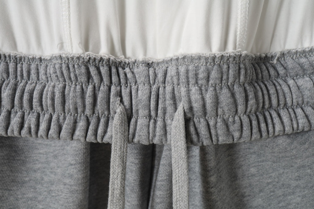 Gray elastic waistband with gathered drawstring openings