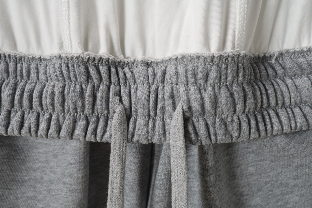 Gray elastic waistband with gathered drawstring openings