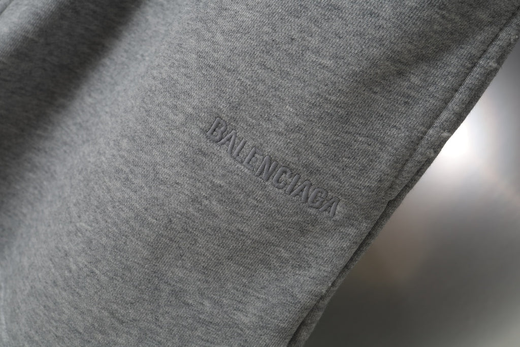 Gray shorts with subtle BALENCIAGA logo embroidery