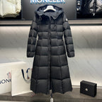 Long puffer coat with drawstring hood, quilted blocks, and front zipper