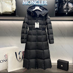 Long puffer coat with hood, front zipper, and quilted diamond stitching