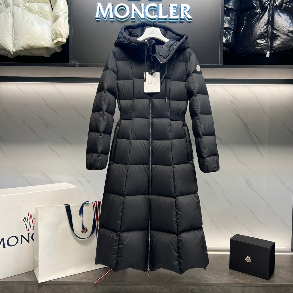 Long puffer coat with hood and quilted design, full-length sleeves
