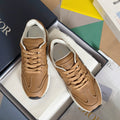 Tan lace-up sneakers with white sole and C logo patch, unisex casual shoes