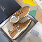 Tan lace-up sneakers in box, C logo front detail and chunky white sole