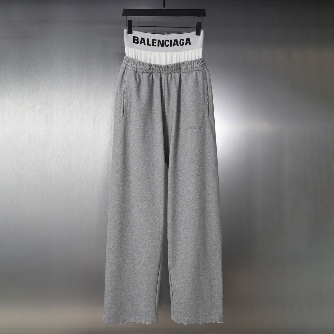 Grey Balenciaga sweatpants with elastic waistband and wide relaxed legs