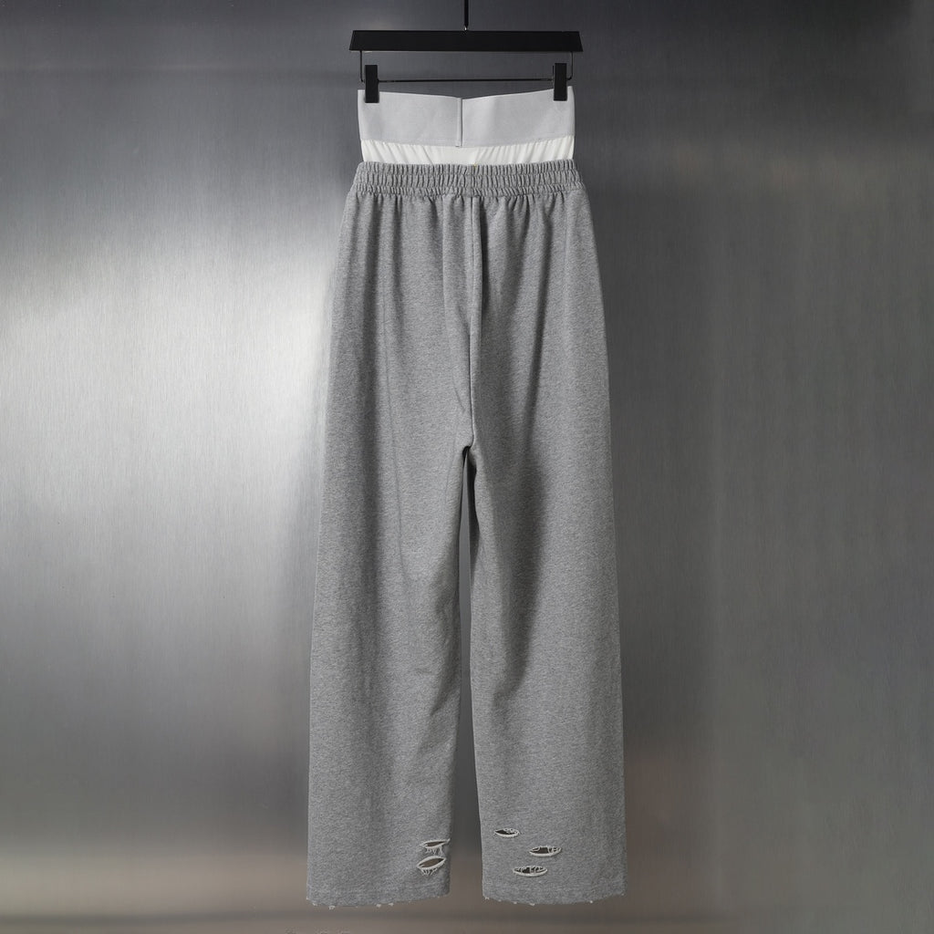 Heather gray wide-leg pants with distressed knee patches