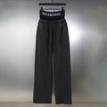 Black Balenciaga pants with elastic waistband and wide legs