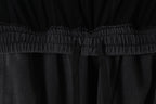 Black pants with elastic waist seam and gathered waistband