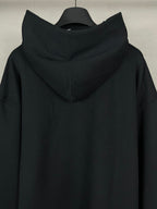 Balenciaga long black hoodie with folded hood and clean back yoke