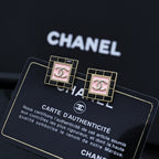 Square Chanel logo stud earrings with pink enamel center and gold-tone trim
