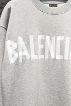Balenciaga crewneck sweatshirt in light gray with large front logo across chest