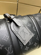 Monogram canvas bag close-up of strap and decorative leather panel