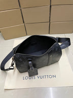 Monogram canvas zip bag with shoulder strap, front view