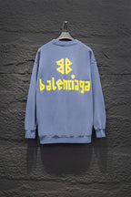 Light blue sweatshirt, crewneck, long sleeves, ribbed cuffs, Balenciaga logo back.