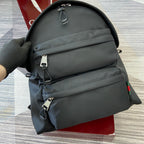 Gucci men’s backpack front view with two zip compartments and top carry loop