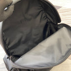 Gucci black backpack interior lining with zip opening and stitched seam