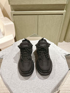 Dior unisex black sneakers with lace-up front and chunky rubber outsole