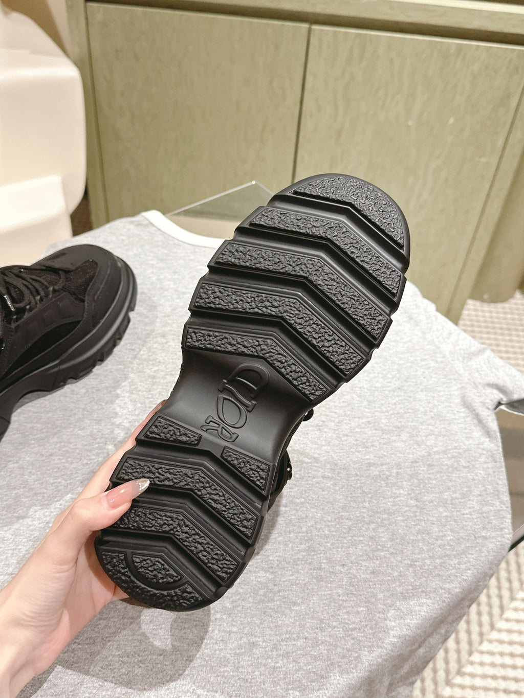 Dior unisex sneaker outsole, black rubber tread with raised pattern