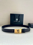 Leather belt with dark blue strap and gold square buckle with VJ logo