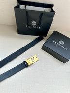 Dark blue belt with gold-tone square VJ logo buckle and perforated holes