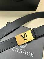 Dark blue leather belt with gold VJ logo buckle and engraved bar