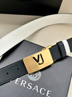 Versace belt with smooth dark leather, white stripes, and gold VJ logo buckle