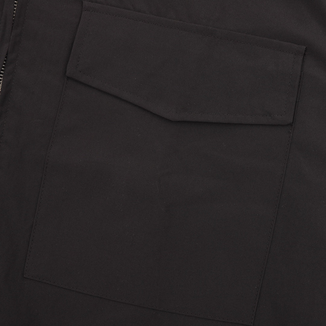 Stone Island jacket with large flap pocket and stitched fabric panel