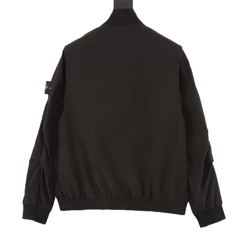 Stone Island dark bomber-style jacket back view with ribbed hem and cuffs