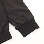 Stone Island jacket sleeve with elastic cuff and gathered hem
