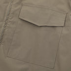 Stone Island bomber jacket chest pocket detail in olive with contrast stitching