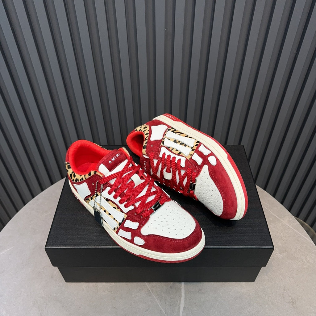 Red and white Amiri sneakers with leopard print toe panels