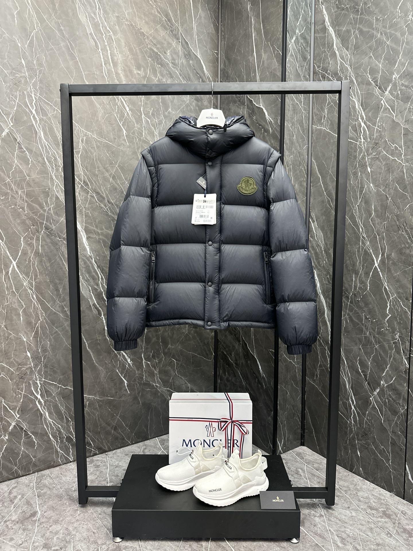 Long quilted puffer jacket with hood, dark navy/black, button front and logo patch