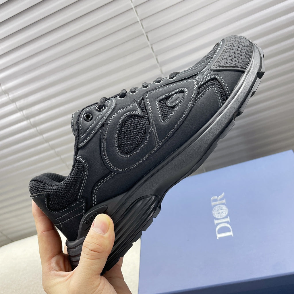 Dior unisex sneakers, on box, dark gray panels with ribbed sole and lace-up.
