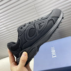 Dior unisex sneakers, on box, dark gray panels with ribbed sole and lace-up.