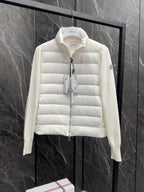 Moncler long padded jacket front view, light white with hang tag at the zipper