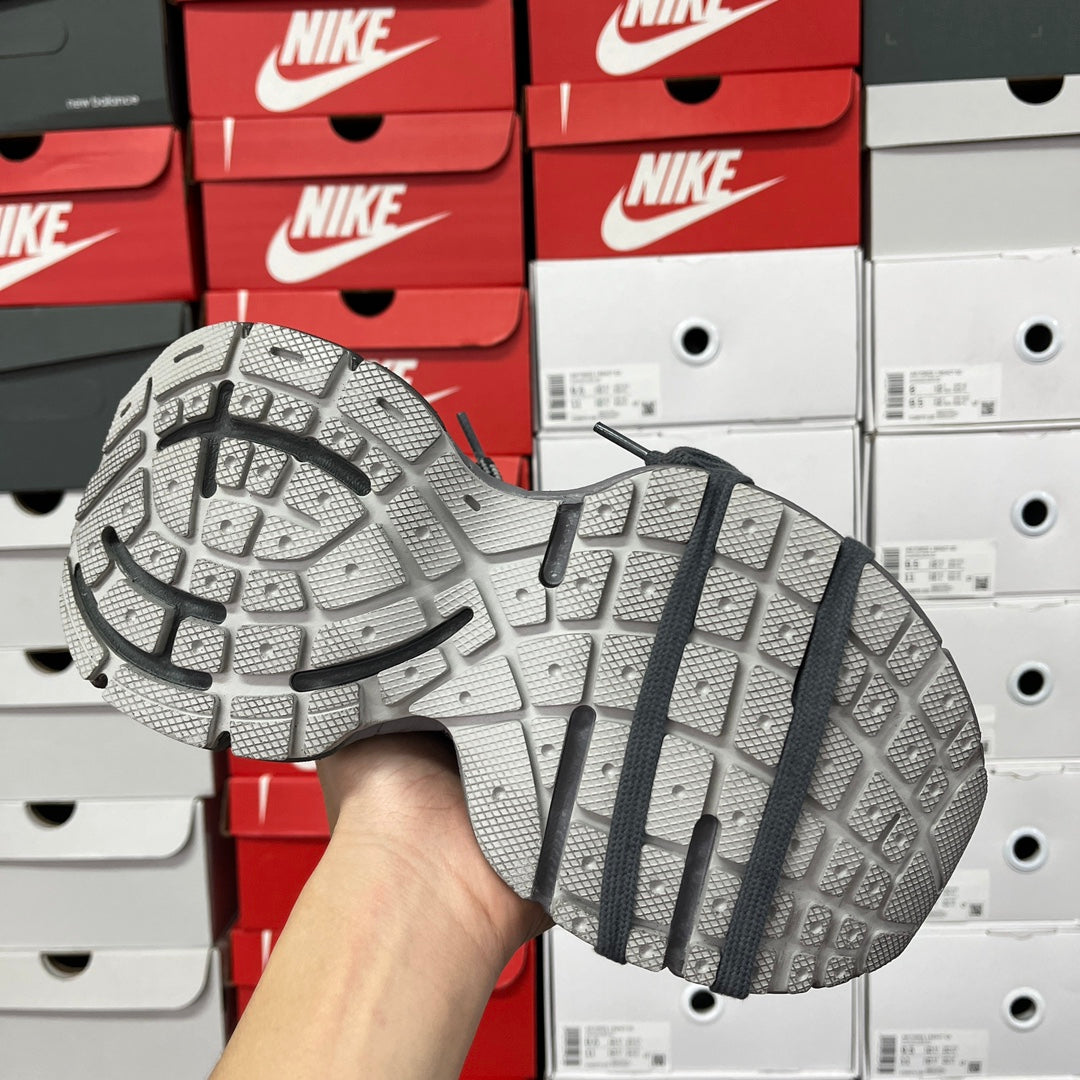 Unisex sneaker outsole, light treaded rubber with molded grooves and central ridge